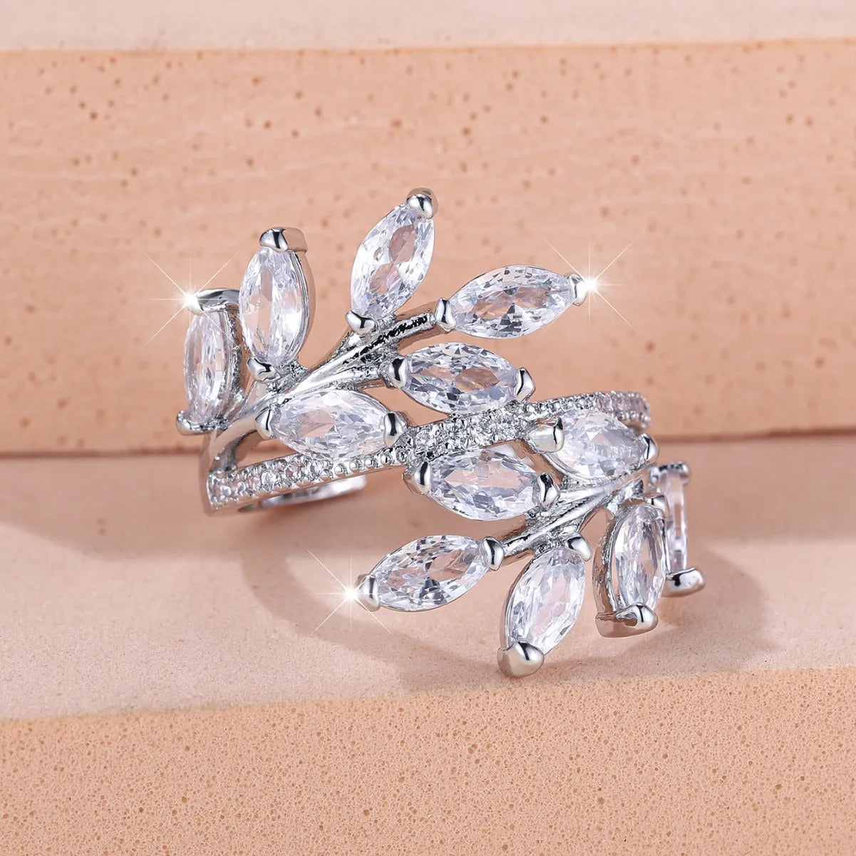 Horse Eye Zircon Leaf Ring with adjustable opening in rose gold purple white diamond colour on a hand