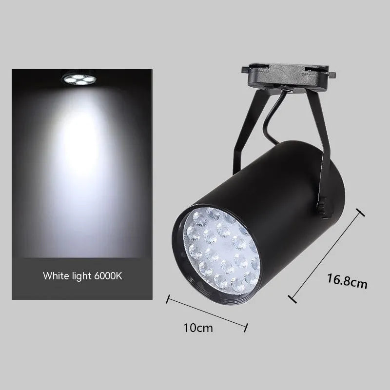 LED track spotlight with aluminium shell in black or white finish, mounted on a lighting track.