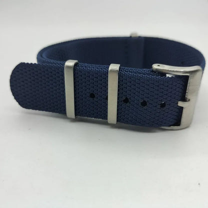 Integrated nylon watch strap in Army Green colour showing textile construction and attachment to watch lugs