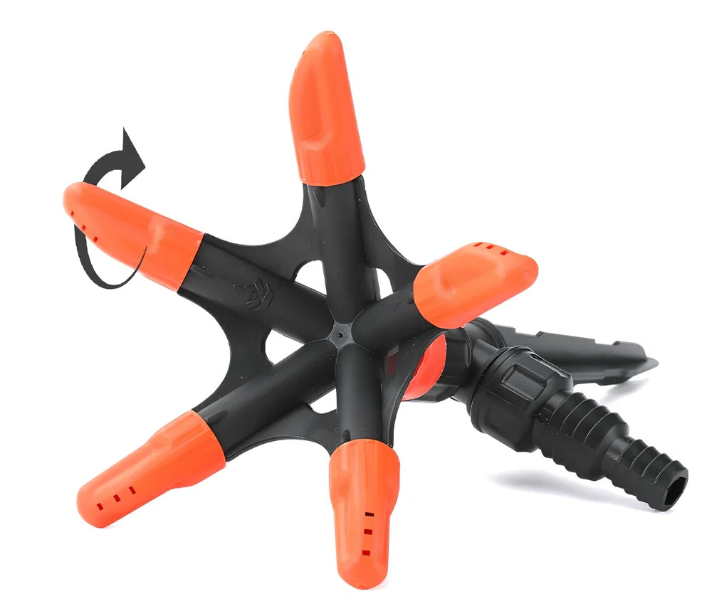Orange automatic rotating garden sprinkler measuring 14cm diameter x 26.5cm height