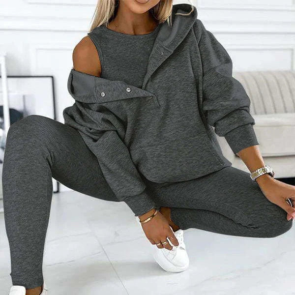 Women's 3-piece sports suit featuring a hooded sweatshirt with pockets and slim trousers