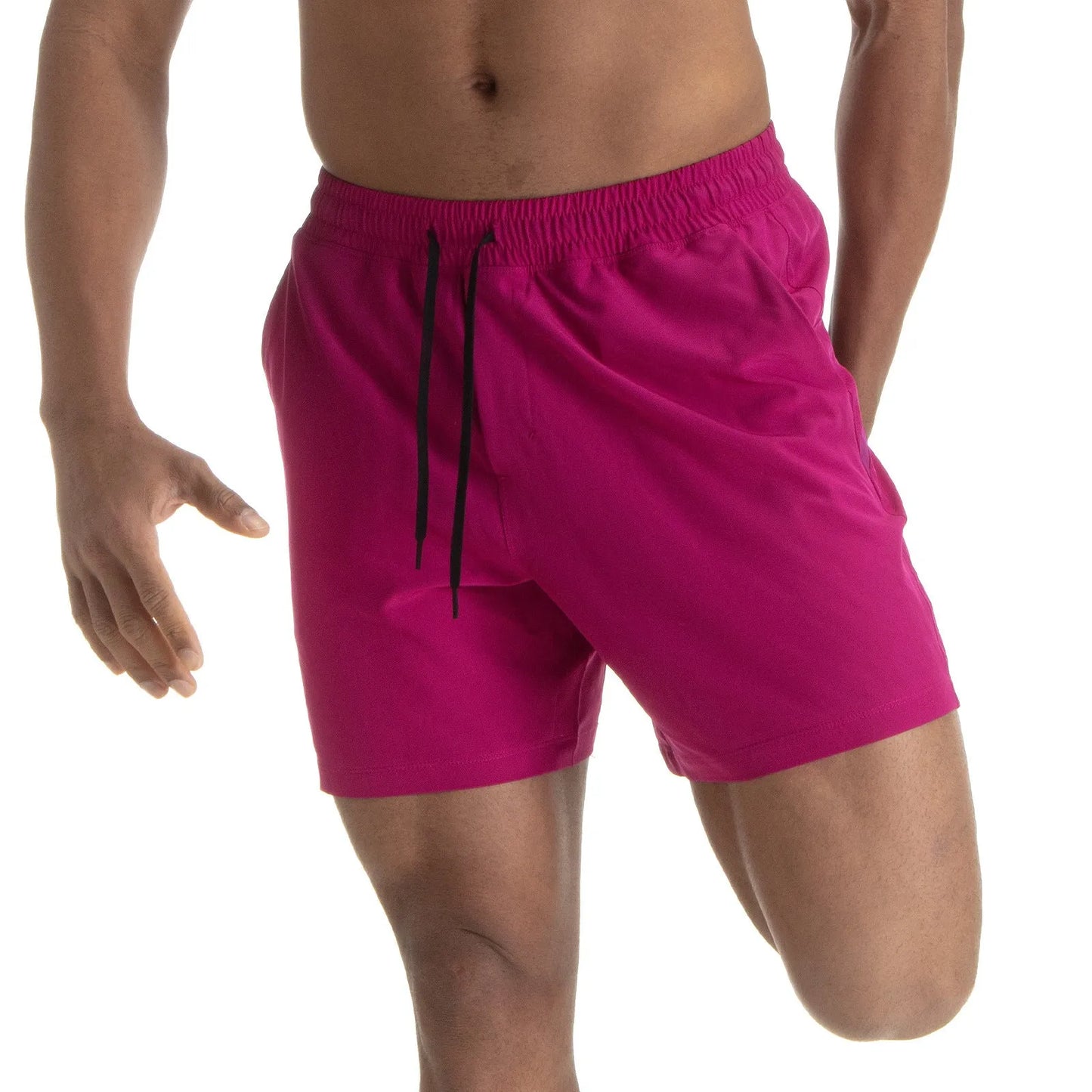 Man wearing black quick-dry polyester sports shorts suitable for running or gym workouts.