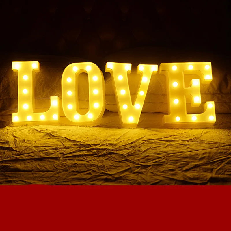 Plastic LED alphabet letter light spelling a message for a birthday or proposal.