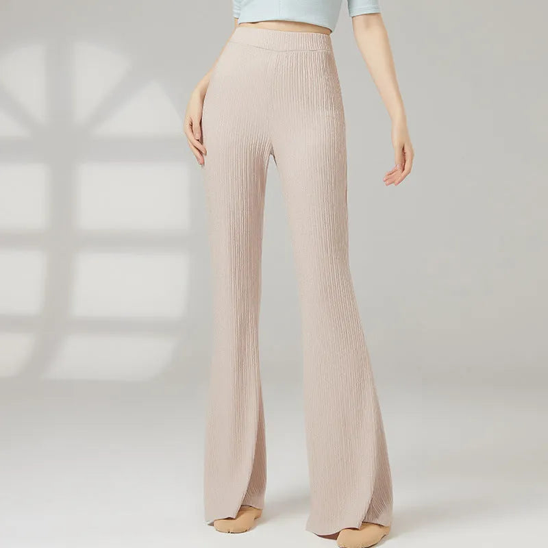 Female classical dance practice training pants in polyester, shown in beige apricot colour.