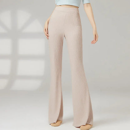 Female classical dance practice training pants in polyester, shown in beige apricot colour.