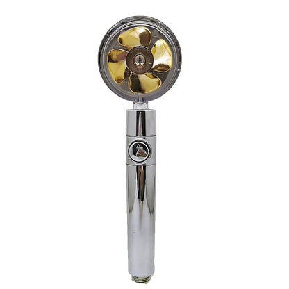 Chrome-finished ABS plastic water-saving shower head with a round, rotating spray head.