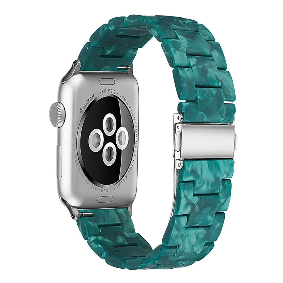 Slim resin Apple Watch strap showing attachment mechanism and colour options