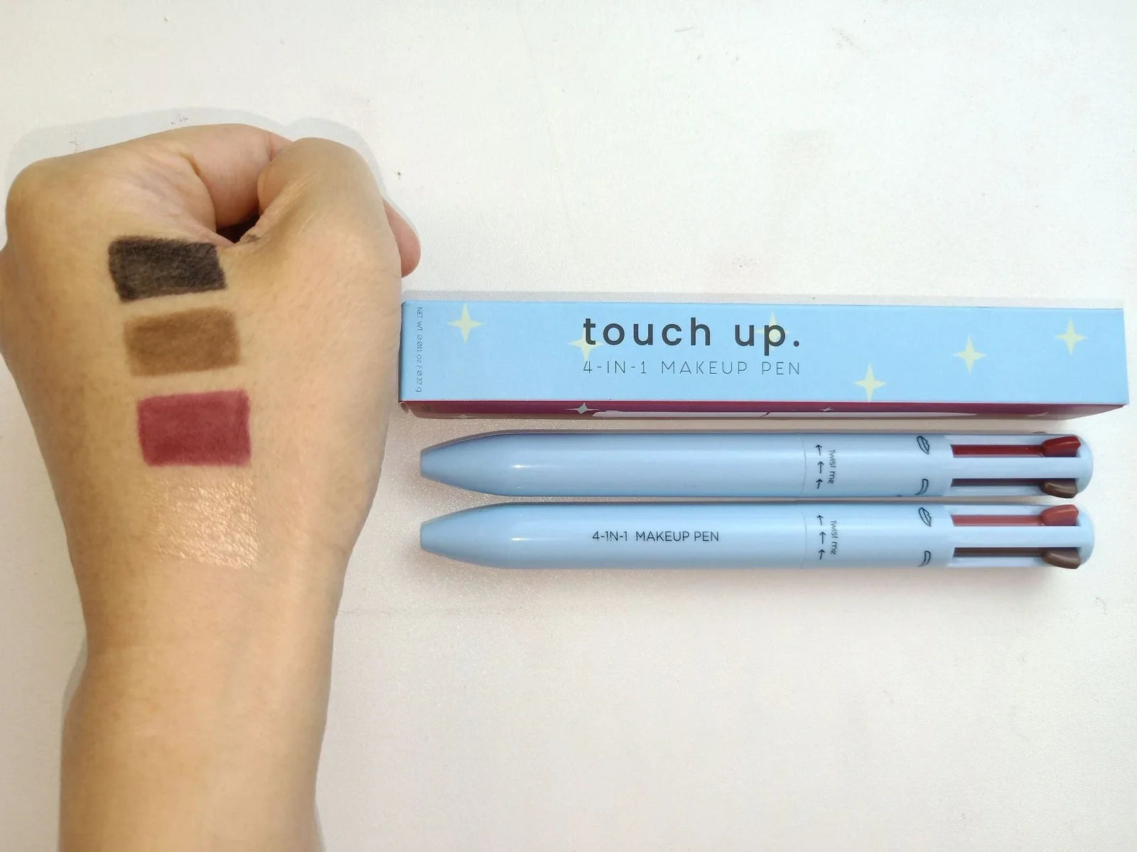 Four-in-one eyebrow pencil showing four colour options in 15cm compact refillable design