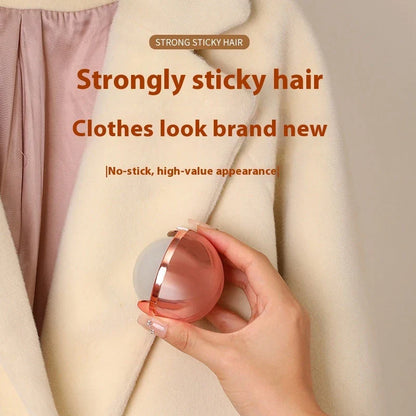 Premium reusable hair remover ball in liquid silver and rose gold colors, used to clean pet hair, lint, and dust from clothes and surfaces