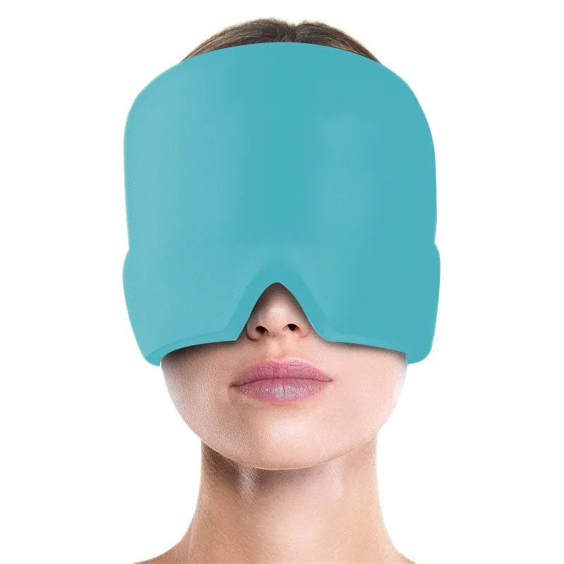Black elastic gel headache relief mask laid flat showing eye contours and adjustable headband.