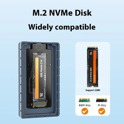 Silver aluminium alloy USB4 hard disk enclosure for M.2 SSDs, shown next to a laptop.