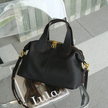 Women's genuine leather cross-body shoulder bag in horizontal square design with multiple internal compartments