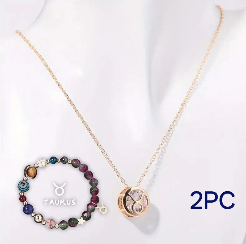 Natural stone beaded necklace and bracelet set laid out flat, showing the coordinated design and textured beads.