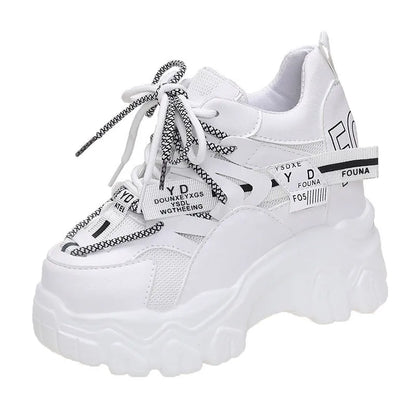 Women's white breathable mesh platform sports shoes with cross-strap detail and rubber sole