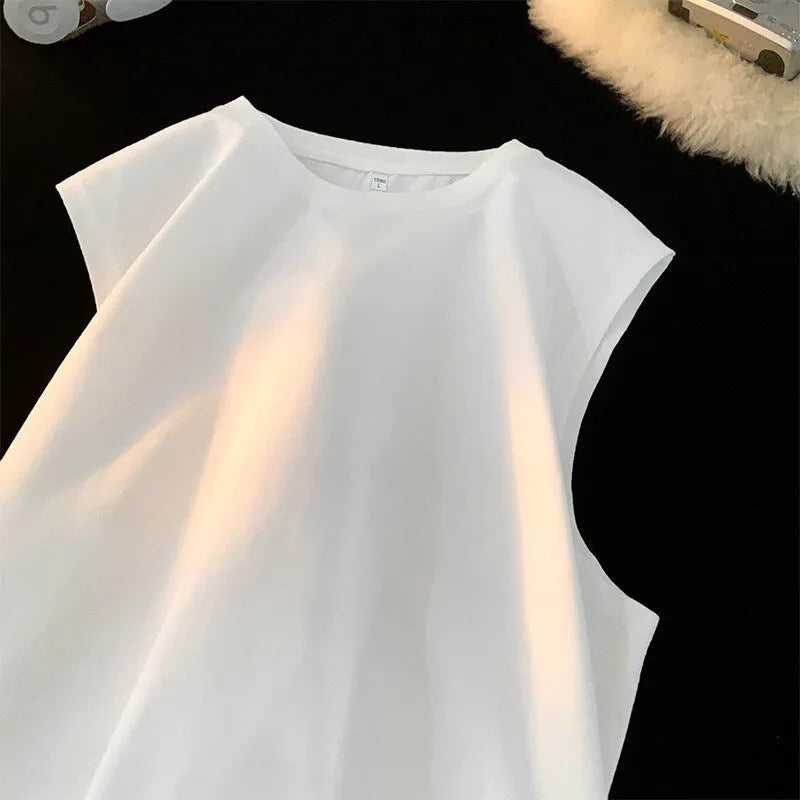 Men's loose solid colour cotton sleeveless tank top on a hanger.