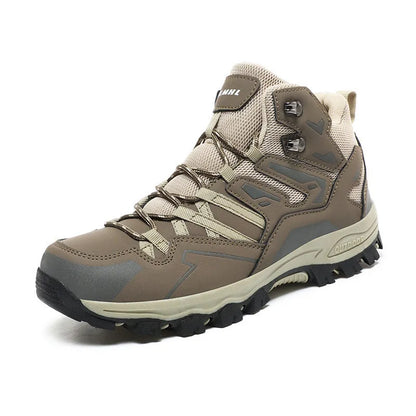 Low-top hiking sneaker in multiple colours on a rocky mountain path, showing lace-up front and rubber sole.