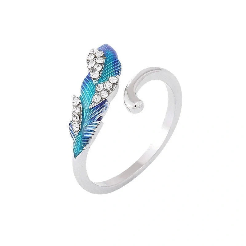 Bright blue feather earring and ring set in lightweight alloy with electroplated finish
