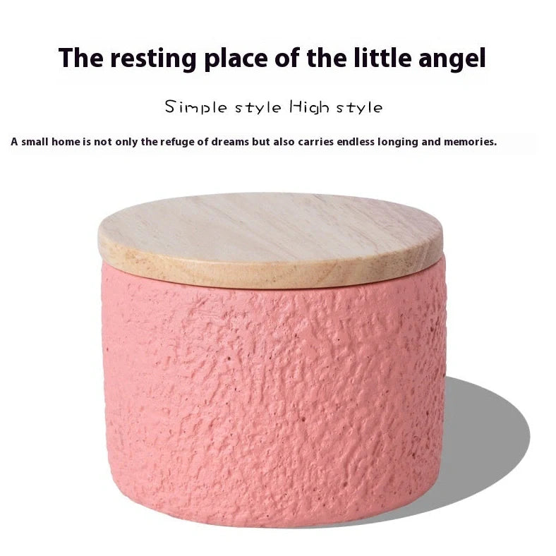 Handmade cement cinerary casket for pet ashes in six colours: black, grey, green, pink, white, yellow