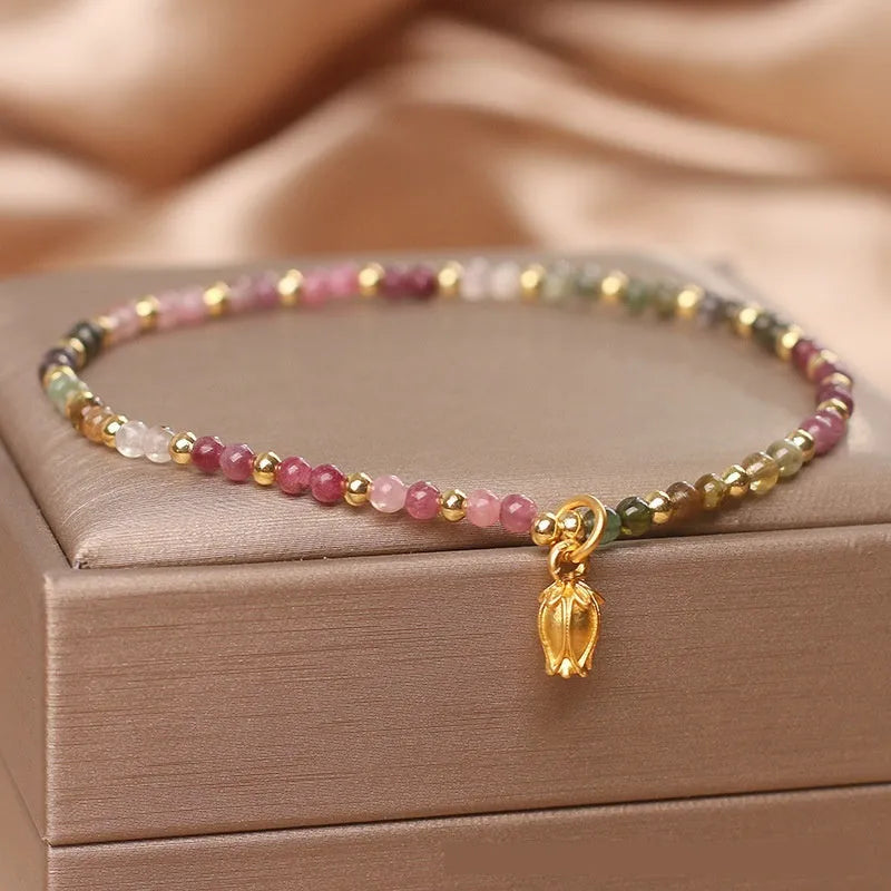 Natural Tourmaline beaded anklet for women in advanced flower style jewellery design, available as both anklet and bracelet with choice of two colour styles in elegant jewellery accessories