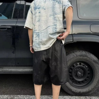 Korean-style loose fit T-shirt with round neck, short sleeves, and head cover detail in solid colour