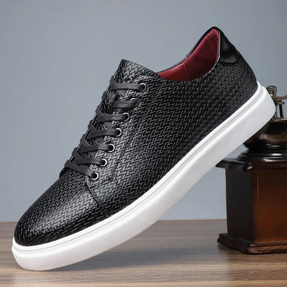 Men's black low-top business shoe with artificial PU leather upper and rubber sole.