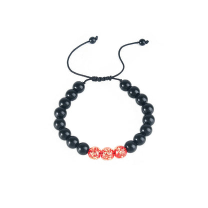 Adjustable bracelet with luminous geometric glass beads in six colour options on a wrist