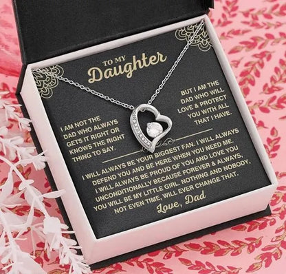Silver hollow openwork heart pendant necklace presented in a gift box with a card.