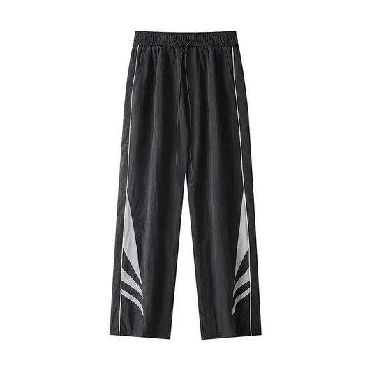 Men's black straight-leg trousers with non-iron fabric, elastic waistband, and plus sizes for summer wear