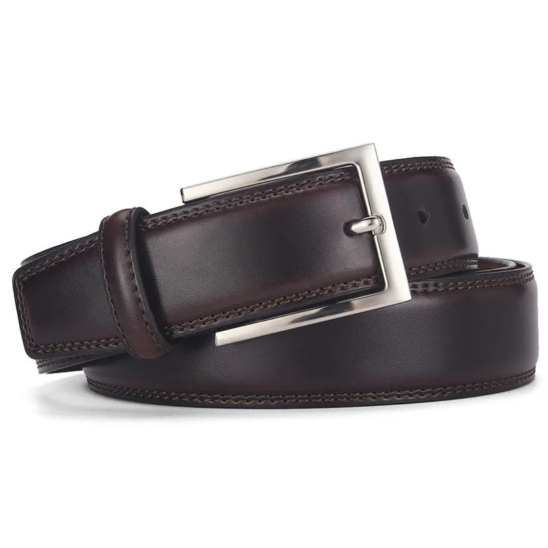 Men's black leather belt with a silver alloy pin buckle laid flat showing its length and width