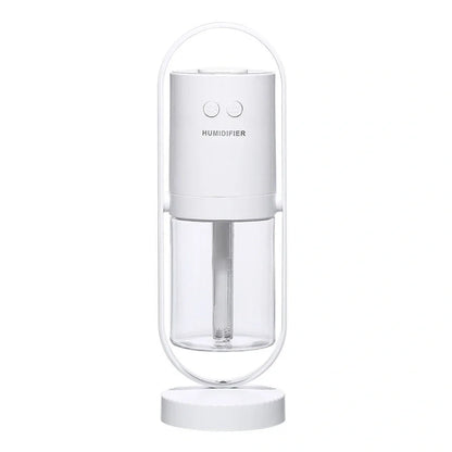 Portable USB humidifier with 200ml water tank in pink, blue, or white showing compact 70x66x213mm dimensions