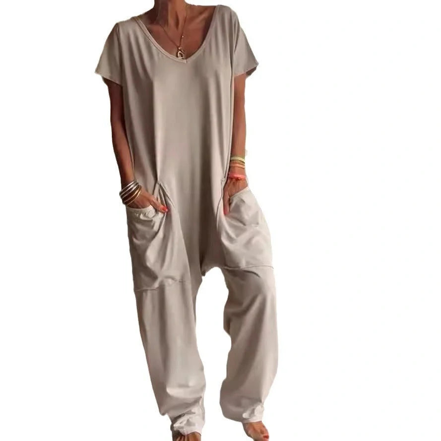 A stylish and comfortable oversized jumpsuit with roomy pockets, available in a variety of vibrant colors.