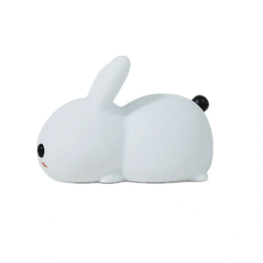 Enchanting silicone rabbit night light with warm and cool white dual-color lighting options, creating a cozy ambiance