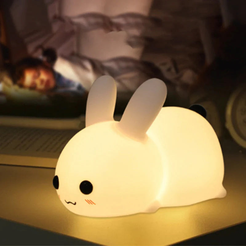 Enchanting silicone rabbit night light with warm and cool white dual-color lighting options, creating a cozy ambiance