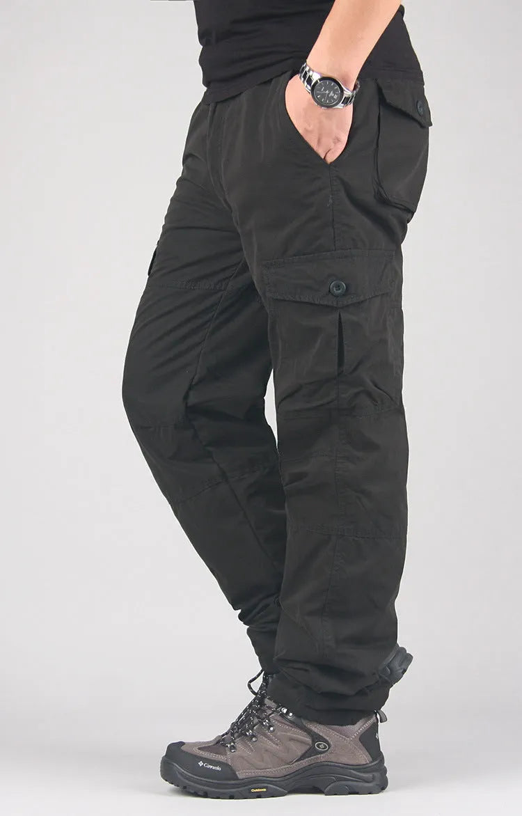 Men's stone-washed cotton overalls with wool lining in khaki colour, showing loose fit and straight leg design