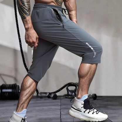 Men's cropped sports pants in quick-drying nylon with straight fit and elastic waistband
