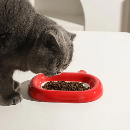Handcrafted ceramic pet bowl with an animal design, for cat or dog food and water.