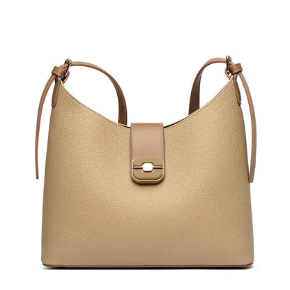 PU bucket shoulder bag in biscuit colour showing internal phone compartment and zippered sections