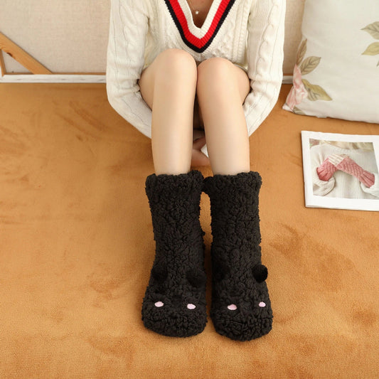 Cozy coral fleece socks with unique Japanese-inspired cartoon designs, providing warm and comfortable indoor lounging and sleeping