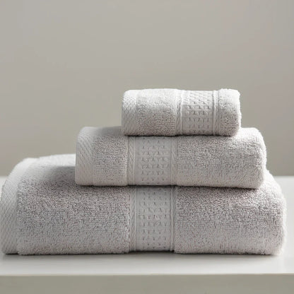 Three cotton towels: 33cm square, 32cm×73cm standard, 70cm×140cm bath towel in coordinated colours