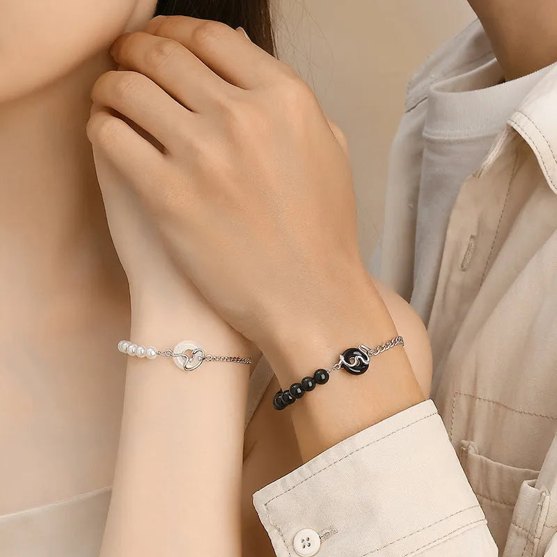 925 sterling silver couple's bracelet with obsidian pearl and snake detail in New Chinese style.