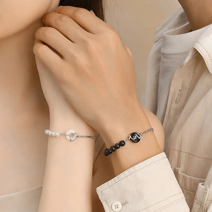 925 sterling silver couple's bracelet with obsidian pearl and snake detail in New Chinese style.