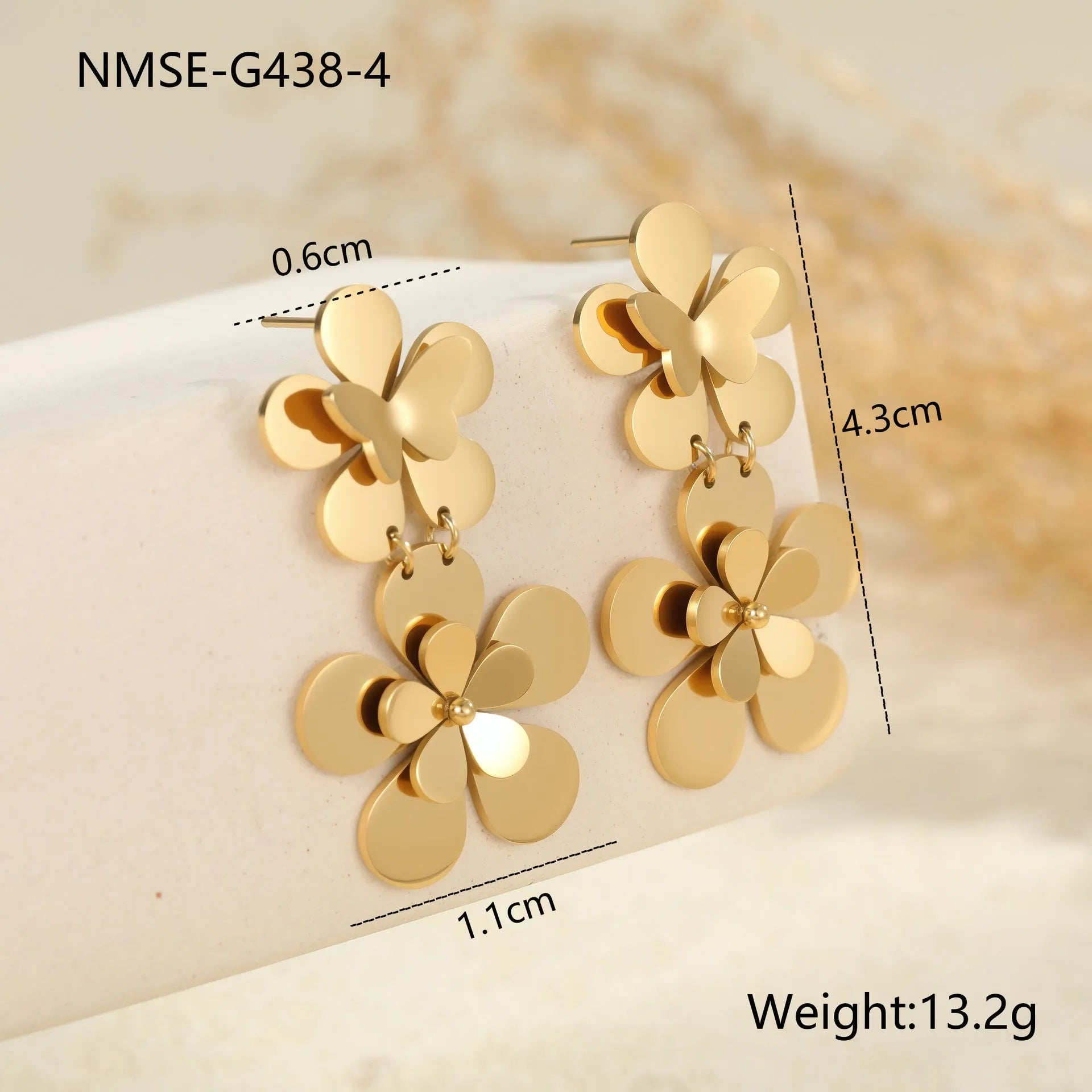 Gold electroplated stainless steel flower butterfly earrings for women with geometric and animal zodiac designs