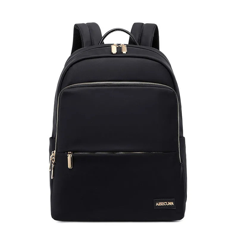Oxford cloth women's backpack in black or purplish grey showing large capacity and padded straps