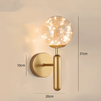 Crystal bedside lamp with stainless steel base and transparent shade providing soft illumination