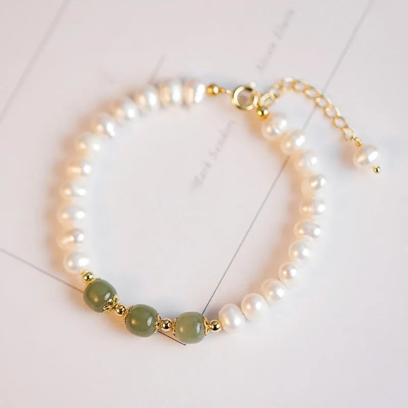 Natural freshwater pearl bracelet with diamond-shaped beads in a Korean style, shown in deep Hetian jade colour.