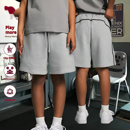 Children's cotton shorts in solid colours with loose fit for sports and casual activities
