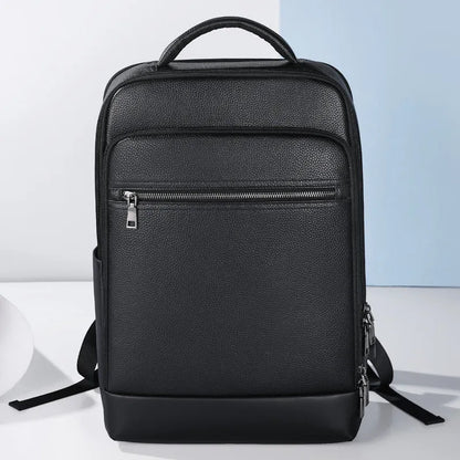 Black genuine leather men's business backpack with curved shoulder straps and sewing line detailing