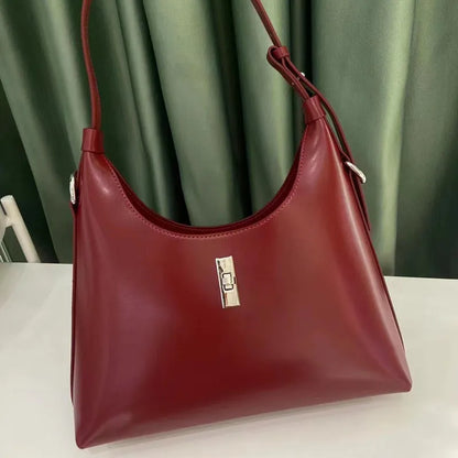 Genuine leather dumpling-shaped crossbody shoulder bag in six colour options showing sandwich pocket and internal organisation