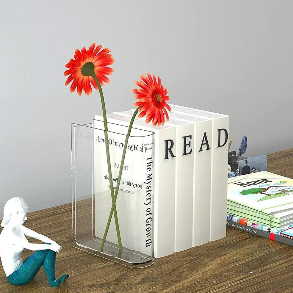 Transparent book-shaped acrylic vase, 22cm long with black font, refracting sunlight for home decor
