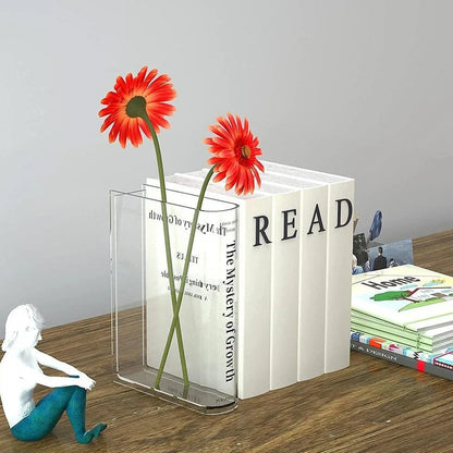 Transparent book-shaped acrylic vase, 22cm long with black font, refracting sunlight for home decor